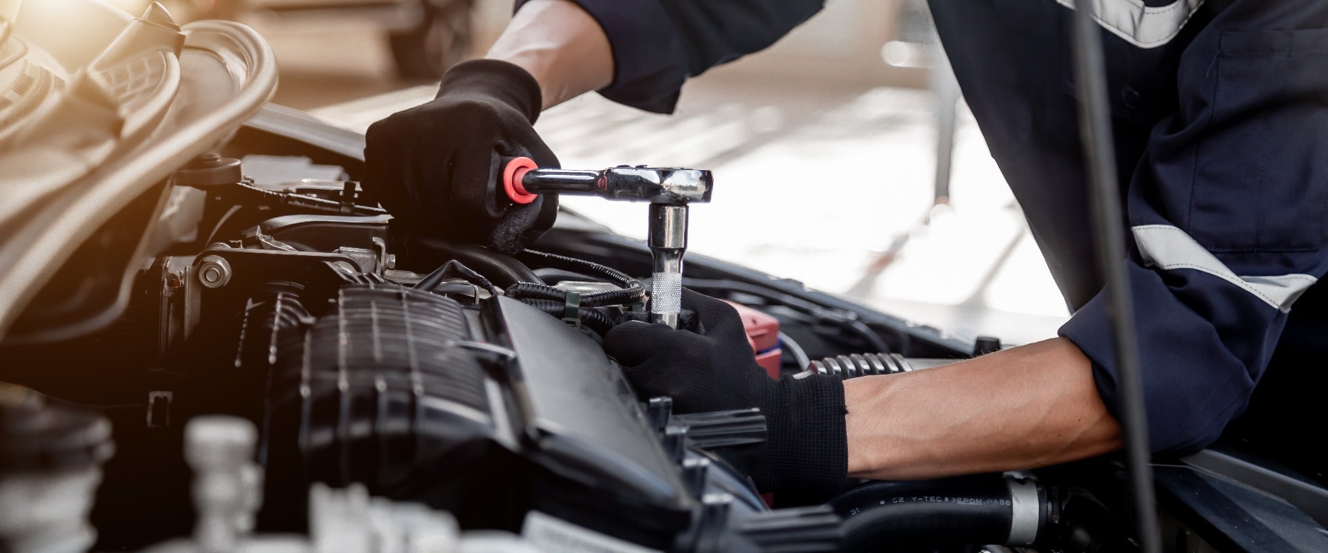 Car care maintenance and servicing, Close-up hand technician auto mechanic using the wrench to repairing change spare part car engine problem and insurance service support.